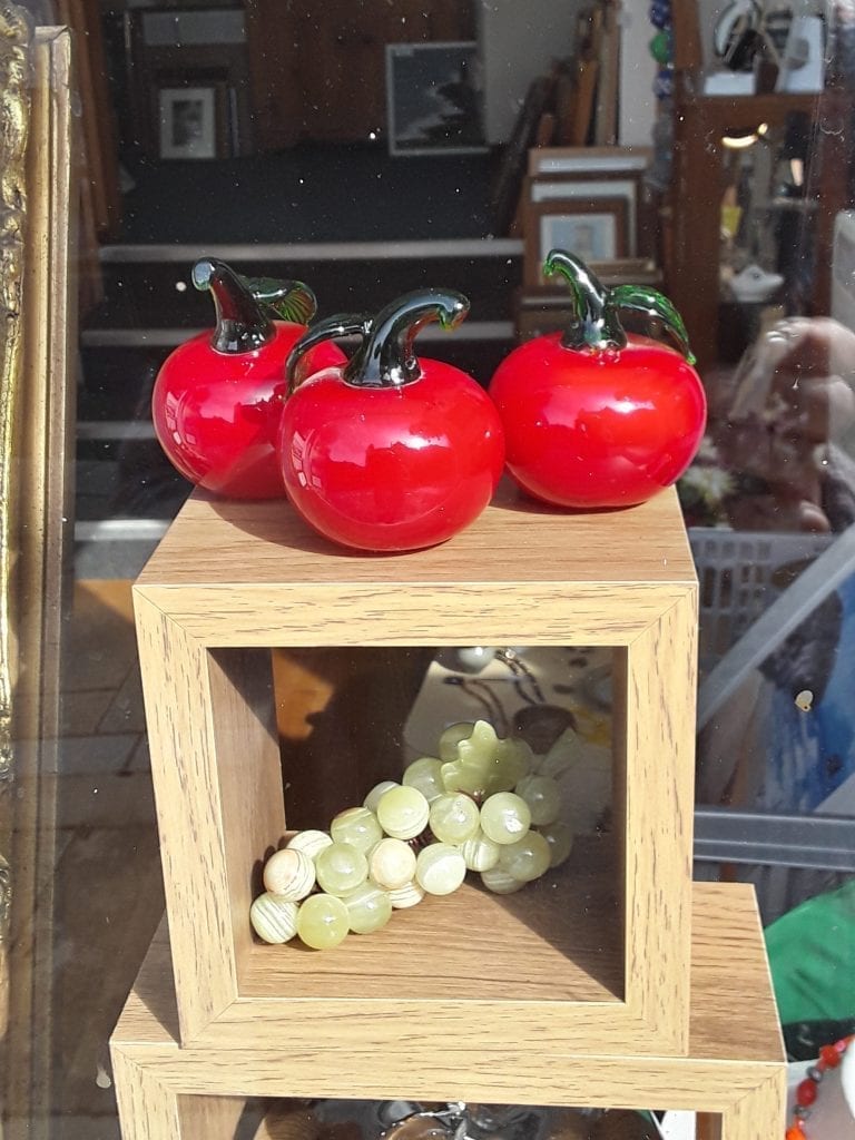 Glass apples and onyx grapes